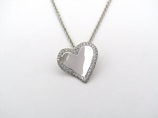 18K gold diamond heart pendant.