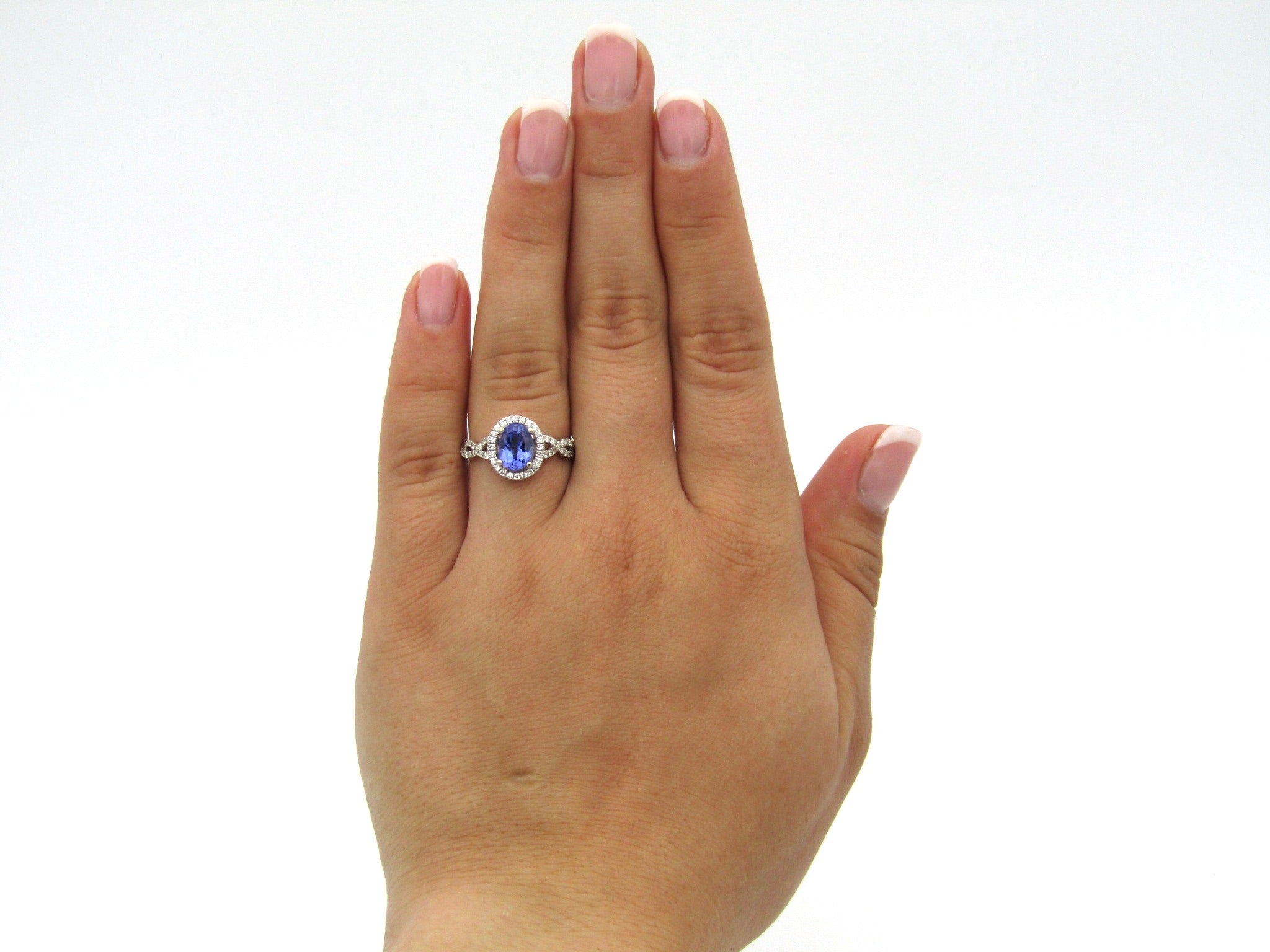 14K gold tanzanite and diamond ring.