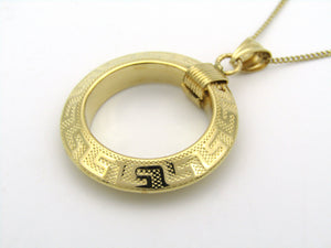 18K gold Versace style Greek key pattern pendant.