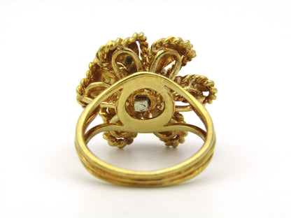 18K gold enamel and diamond flower ring.