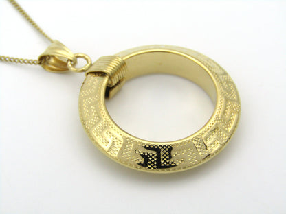 18K gold Versace style Greek key pattern pendant.