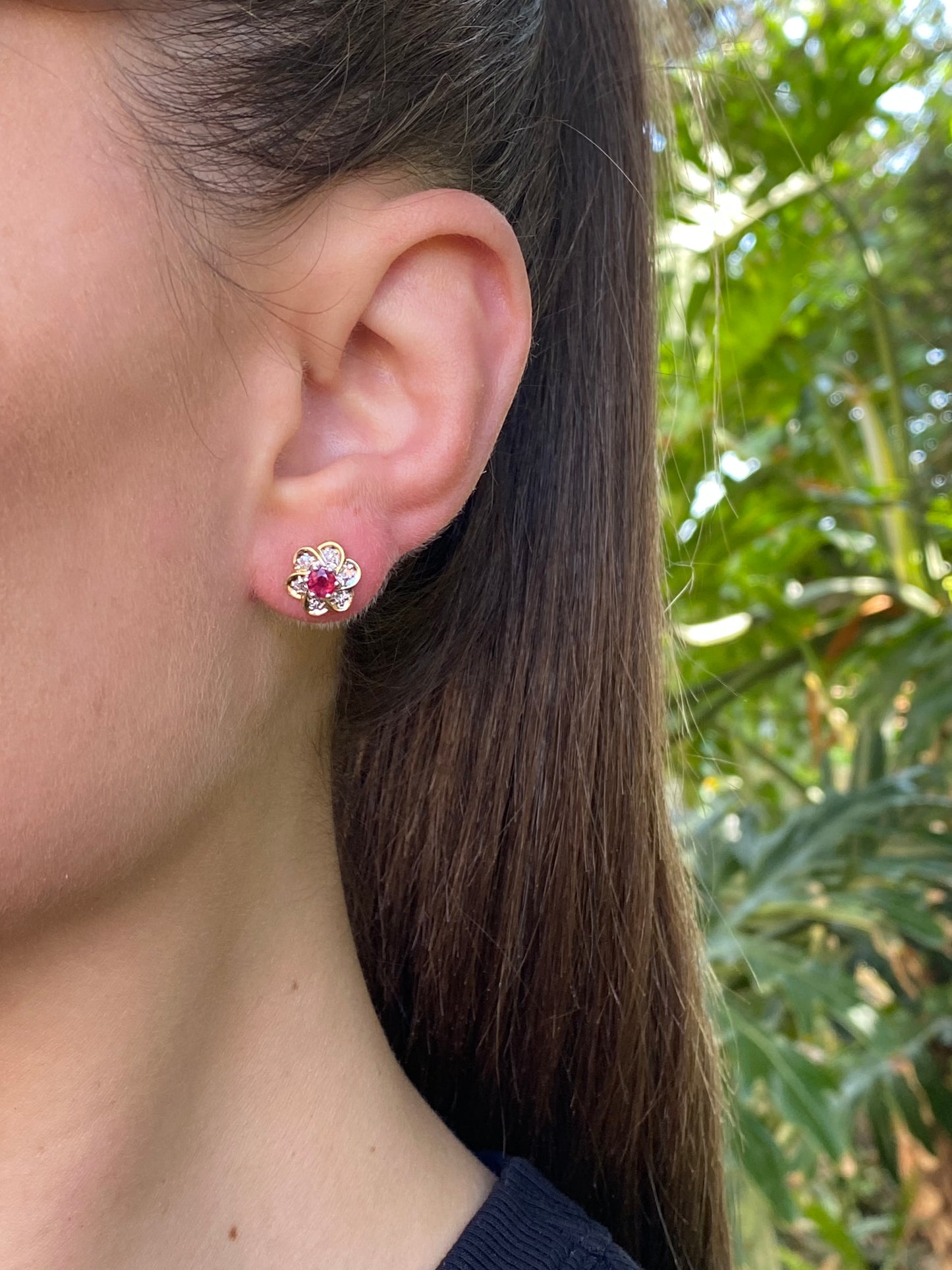 14K gold ruby and diamond flower earrings.