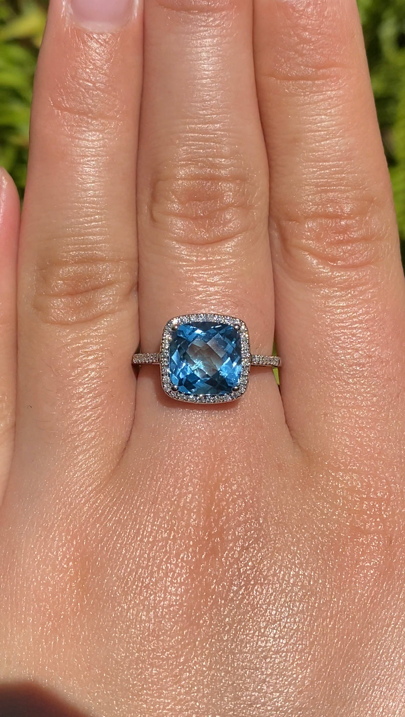 14K gold blue topaz and diamond ring by Browns.