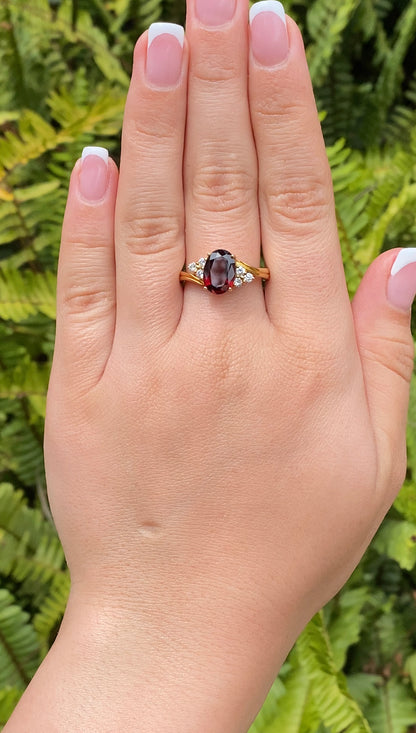 18K gold garnet and diamond ring.