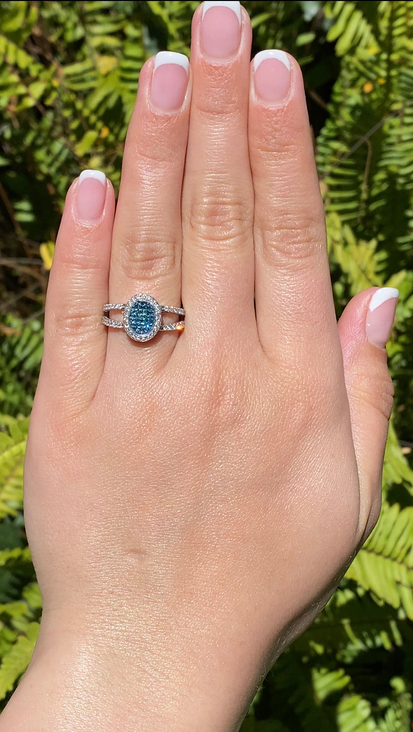 18K gold blue and colourless diamond ring.