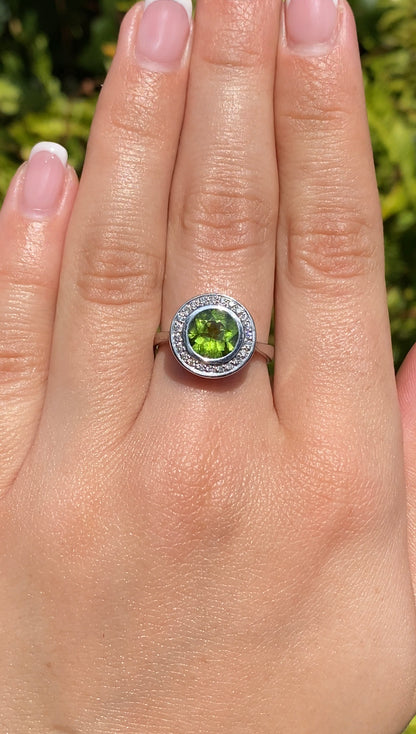 9K gold peridot and diamond ring.