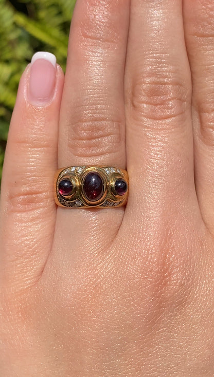 18K gold Rhodolite garnet and diamond ring by Orpheo.