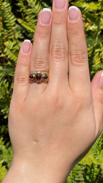 18K gold Rhodolite garnet and diamond ring by Orpheo.