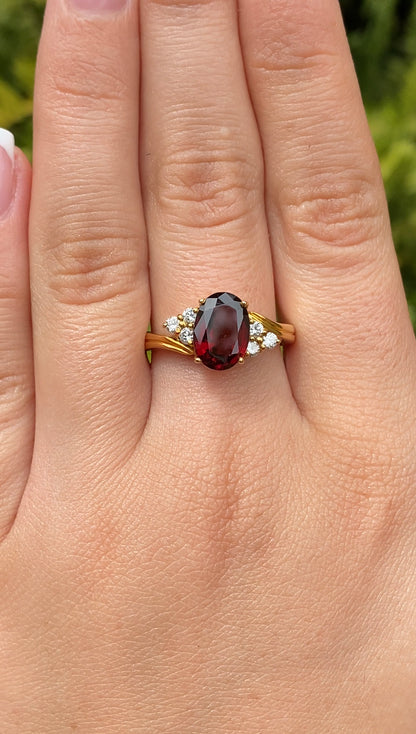 18K gold garnet and diamond ring.