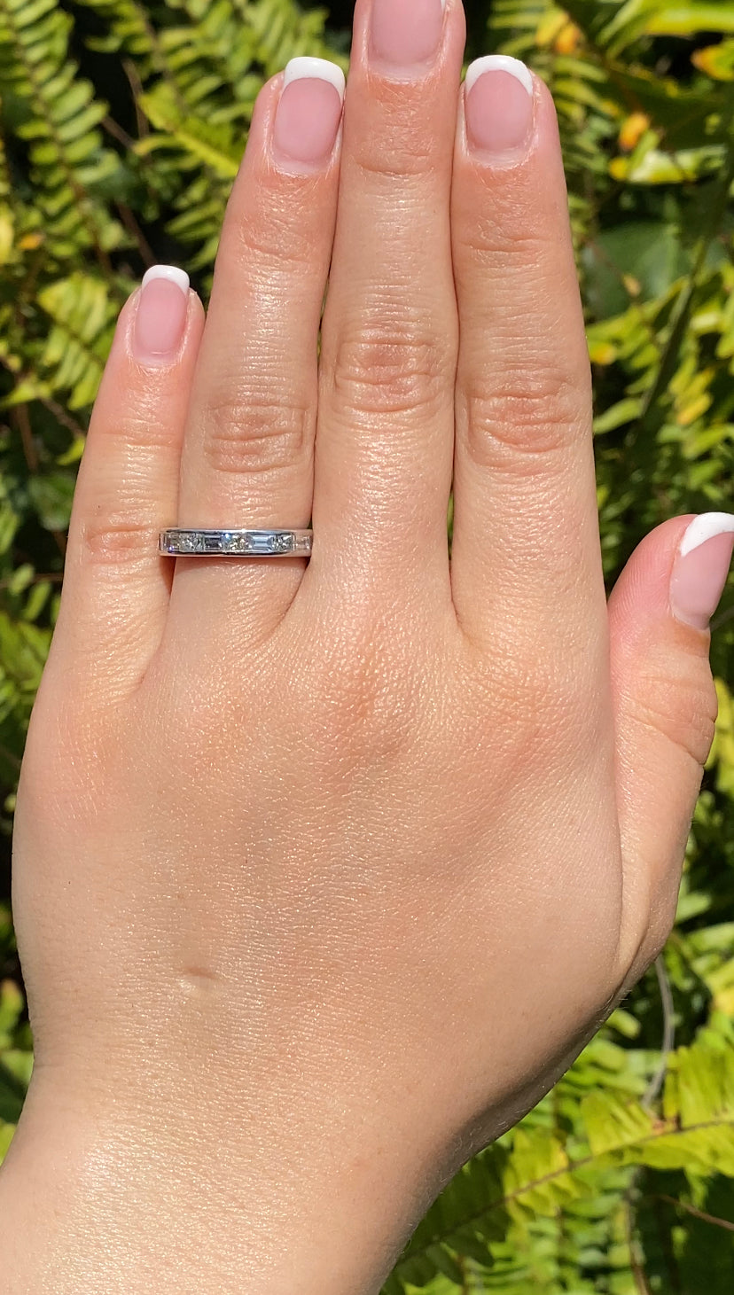 18K gold diamond eternity ring.