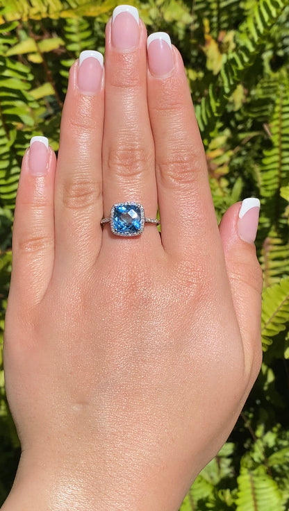 14K gold blue topaz and diamond ring by Browns.