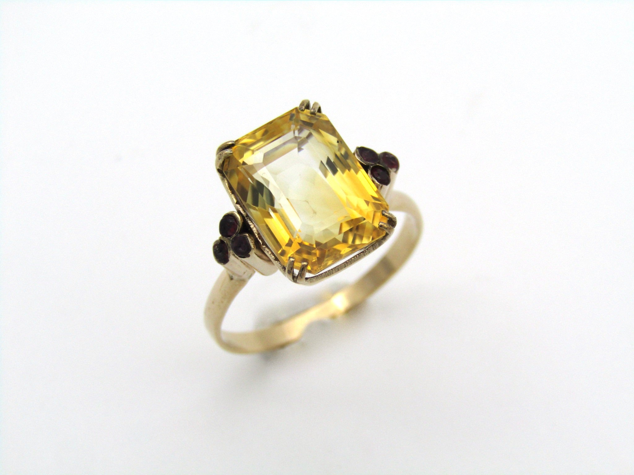 9K gold citrine and ruby ring.