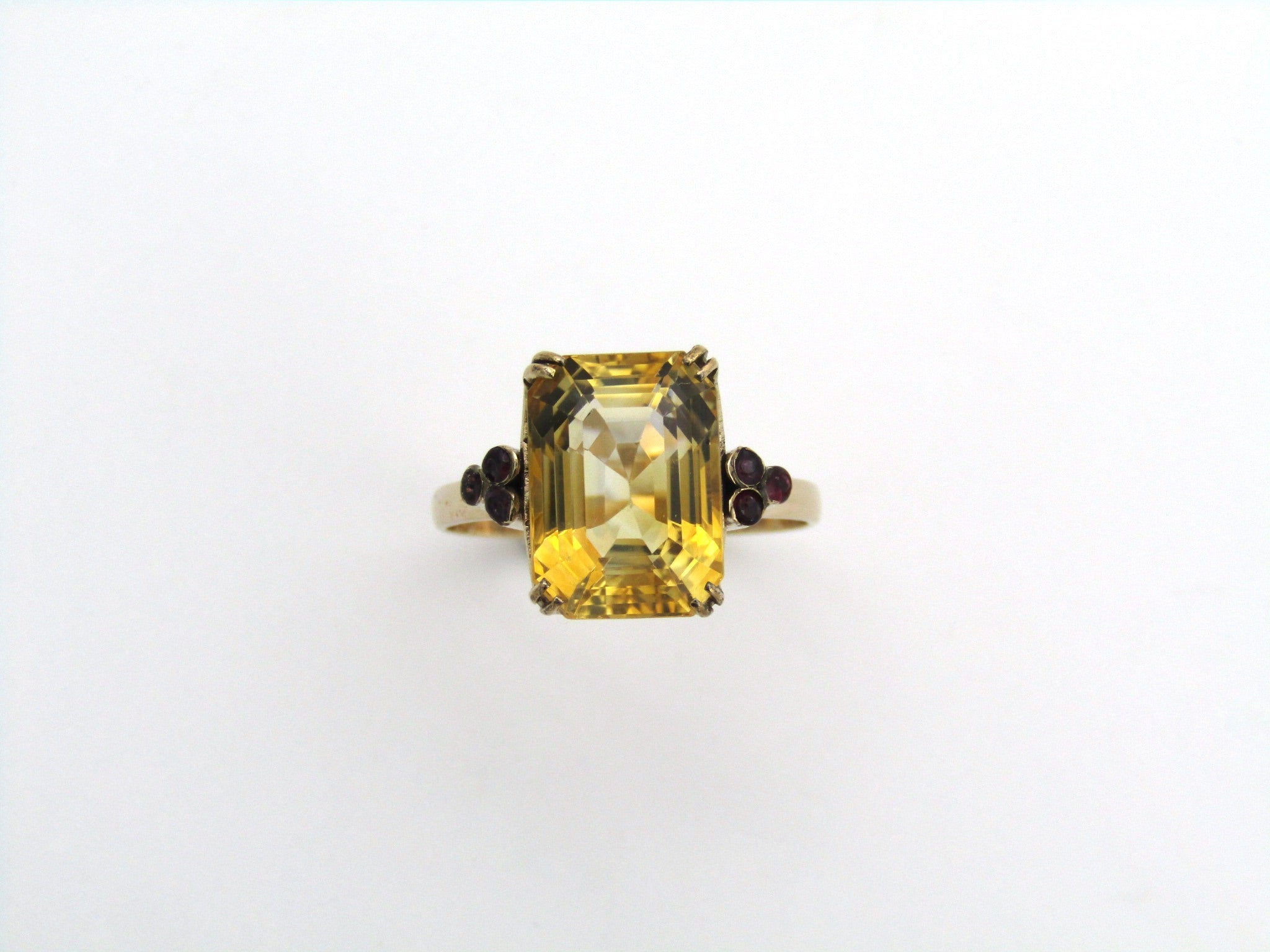 9K gold citrine and ruby ring.