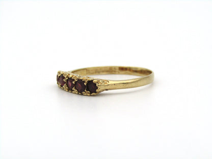 9K gold garnet ring.