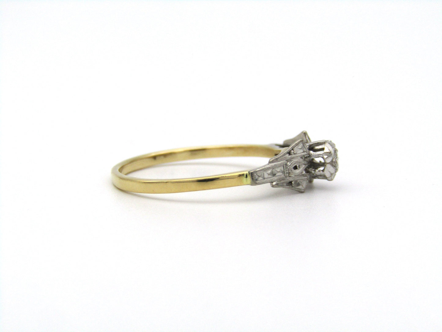 18K gold diamond ring.