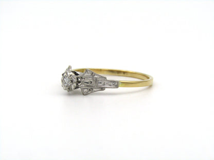 18K gold diamond ring.