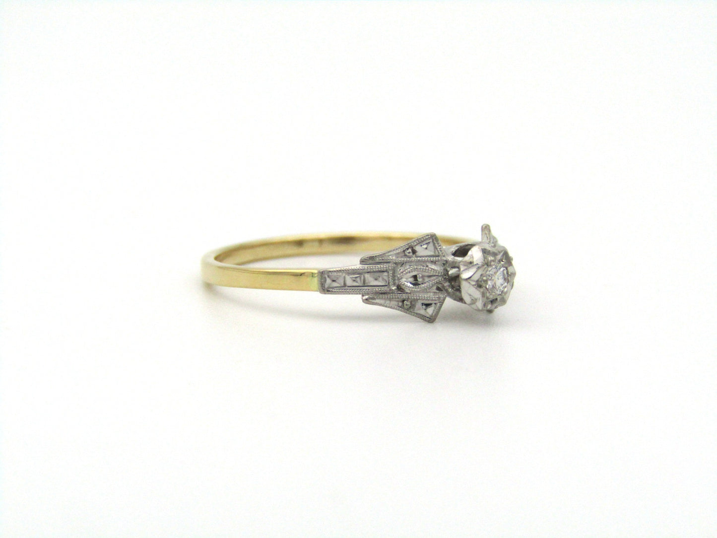 18K gold diamond ring.