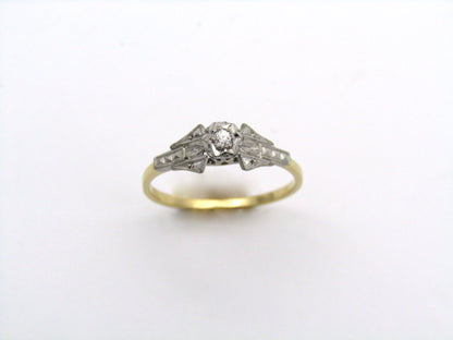 18K gold diamond ring.