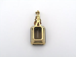 9K gold smoky quartz pendant.