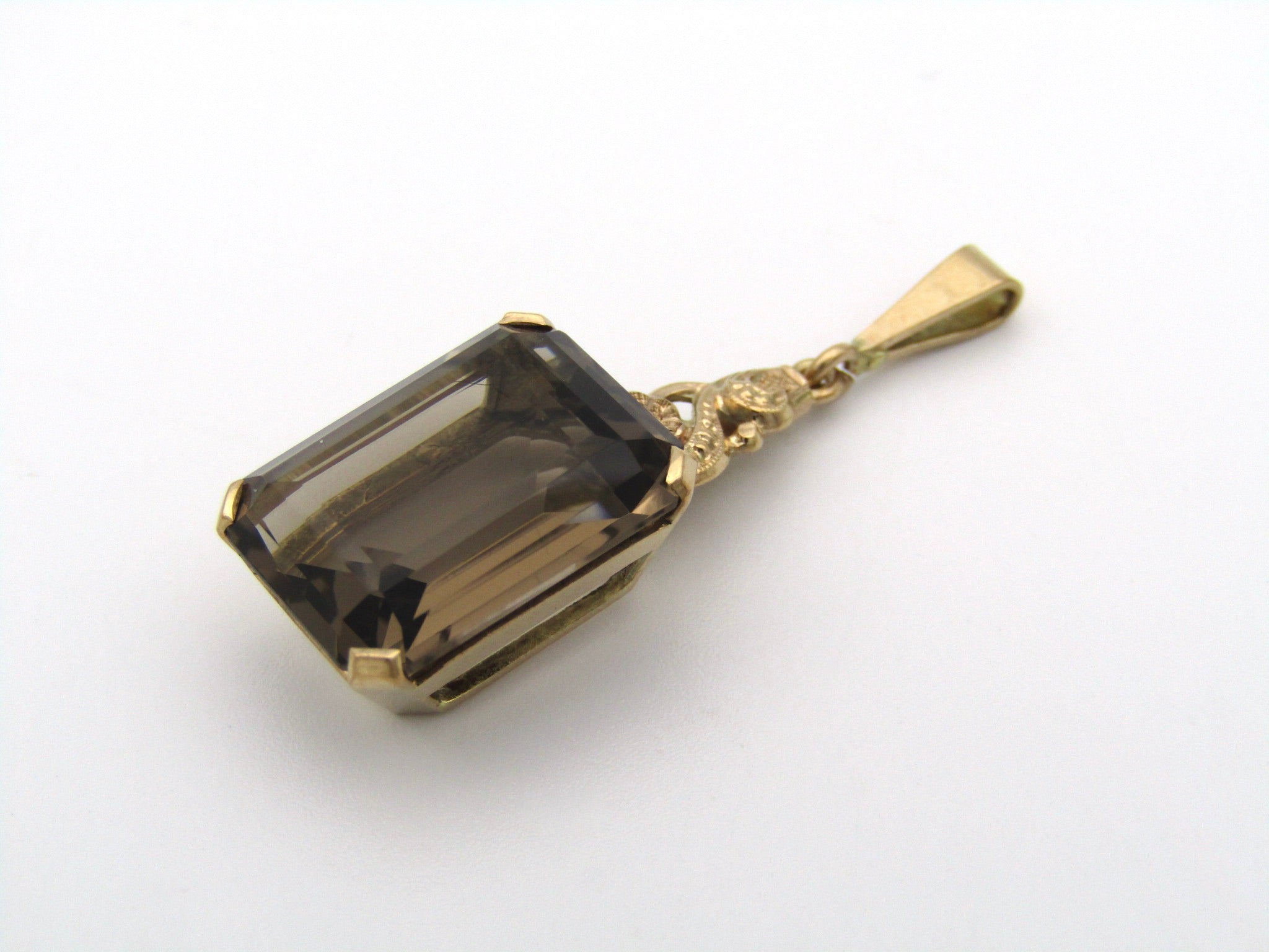 9K gold smoky quartz pendant.