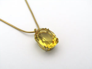 9K gold citrine pendant.