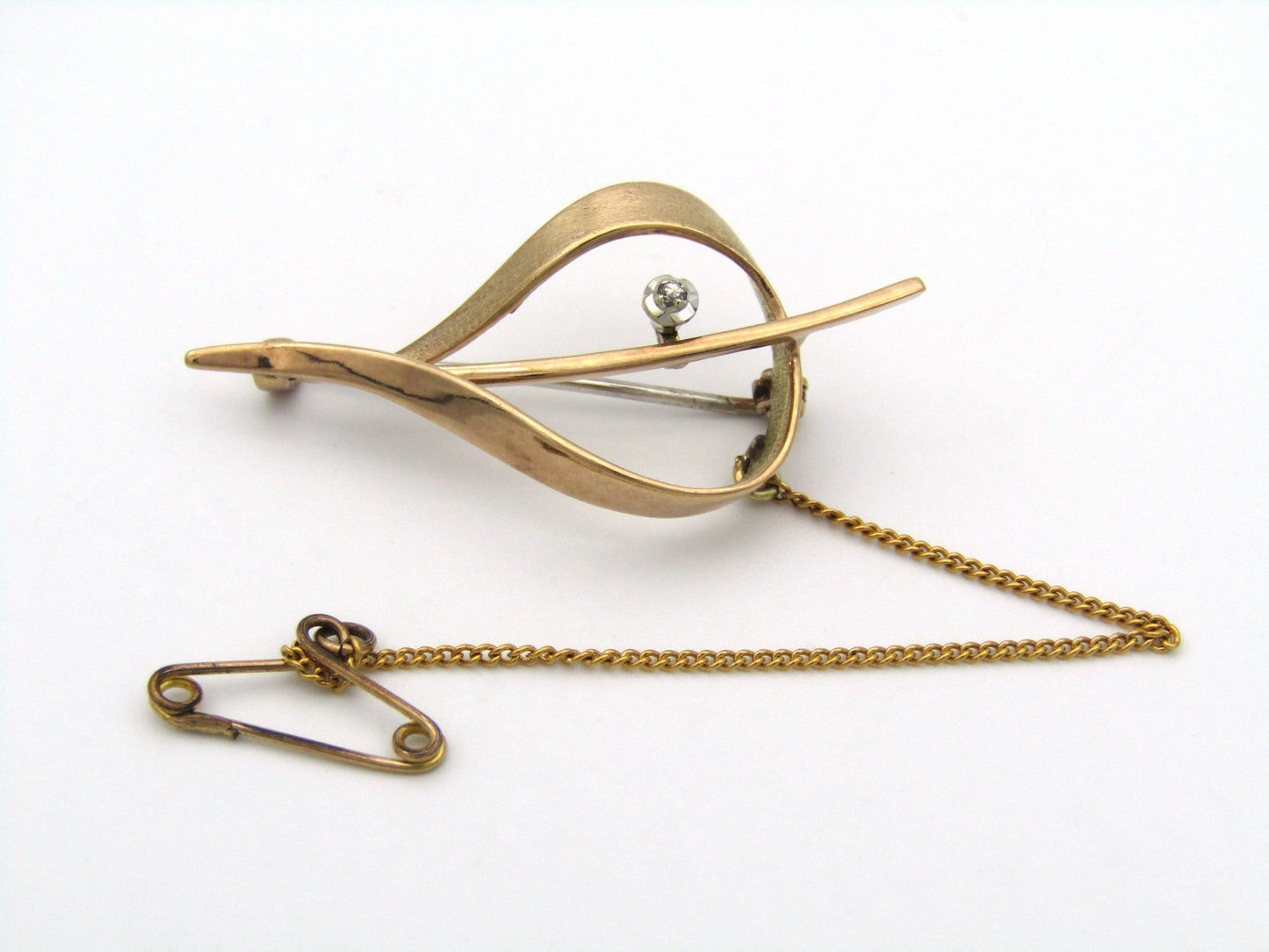 9K gold retro diamond brooch.