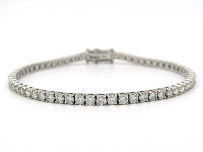 18K gold diamond tennis bracelet.