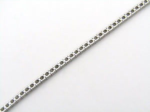 18K gold diamond tennis bracelet.