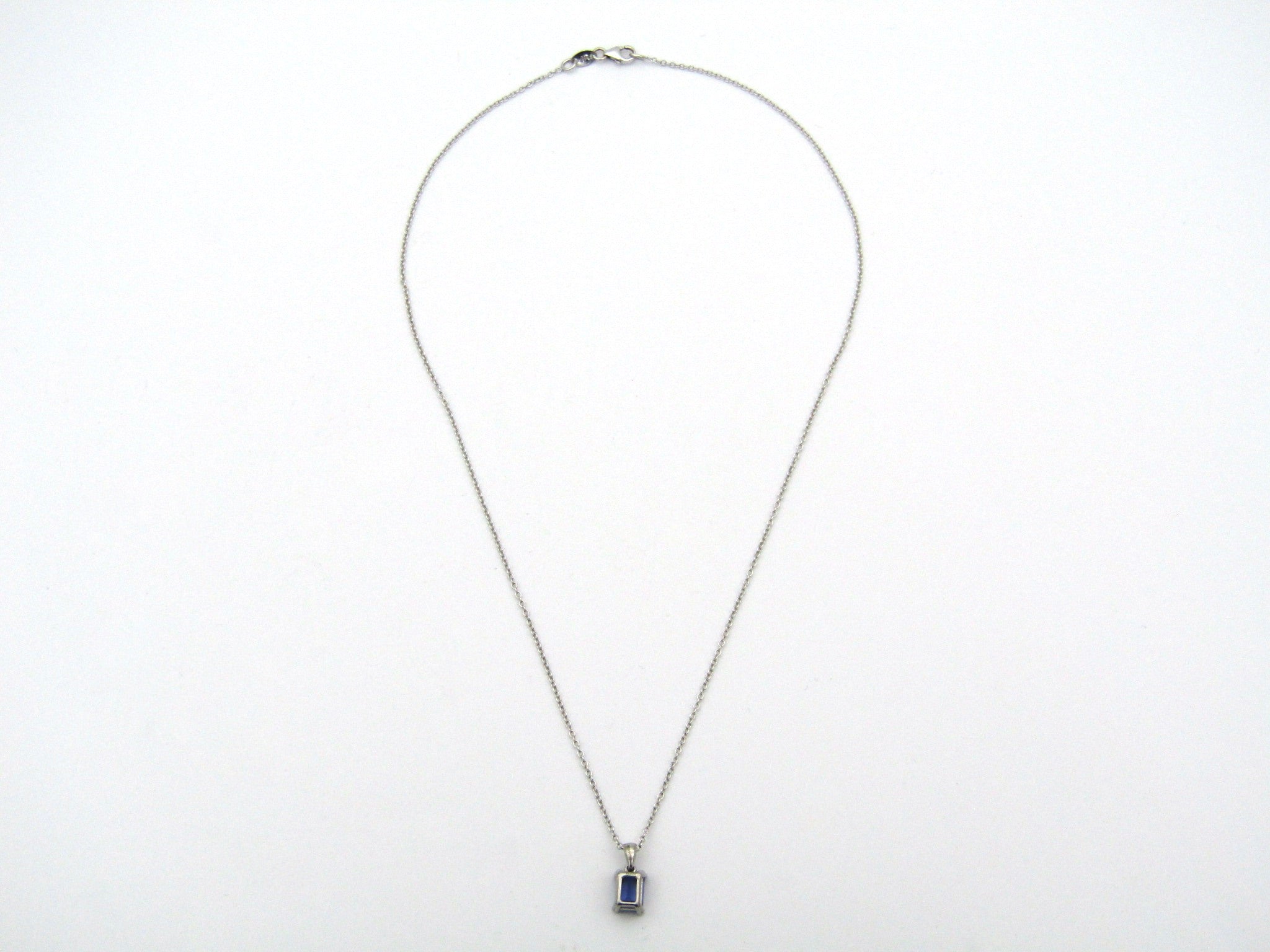 9K gold tanzanite pendant by Browns.