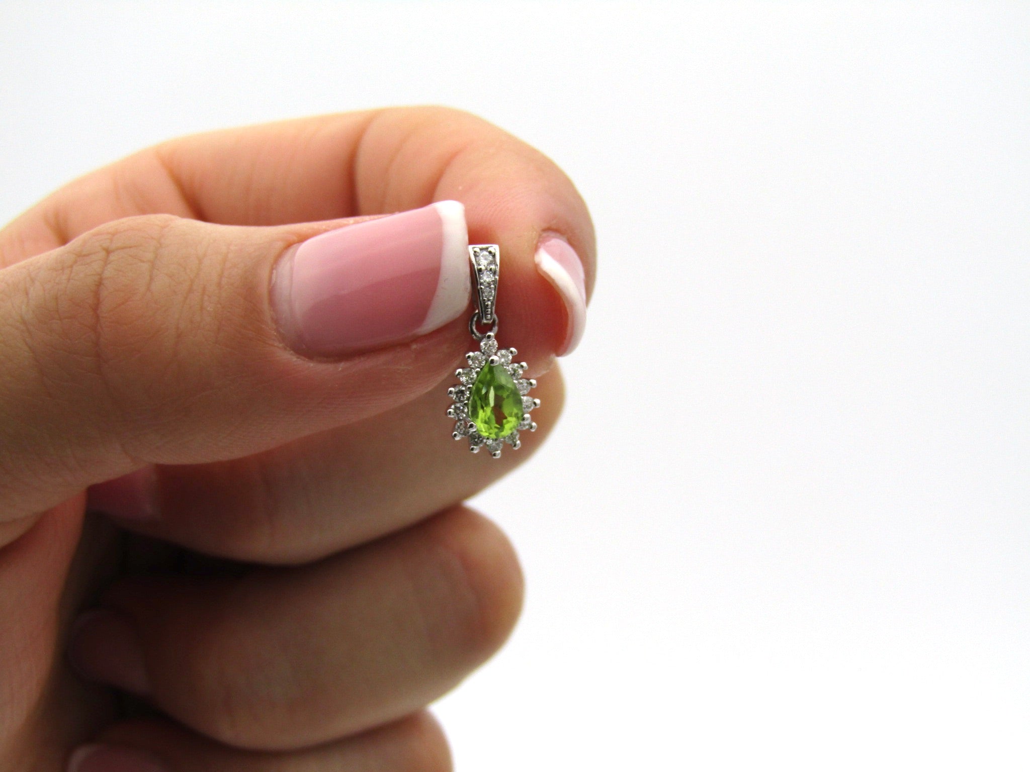 18K gold peridot and diamond earrings and pendant.