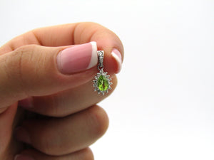 18K gold peridot and diamond earrings and pendant.