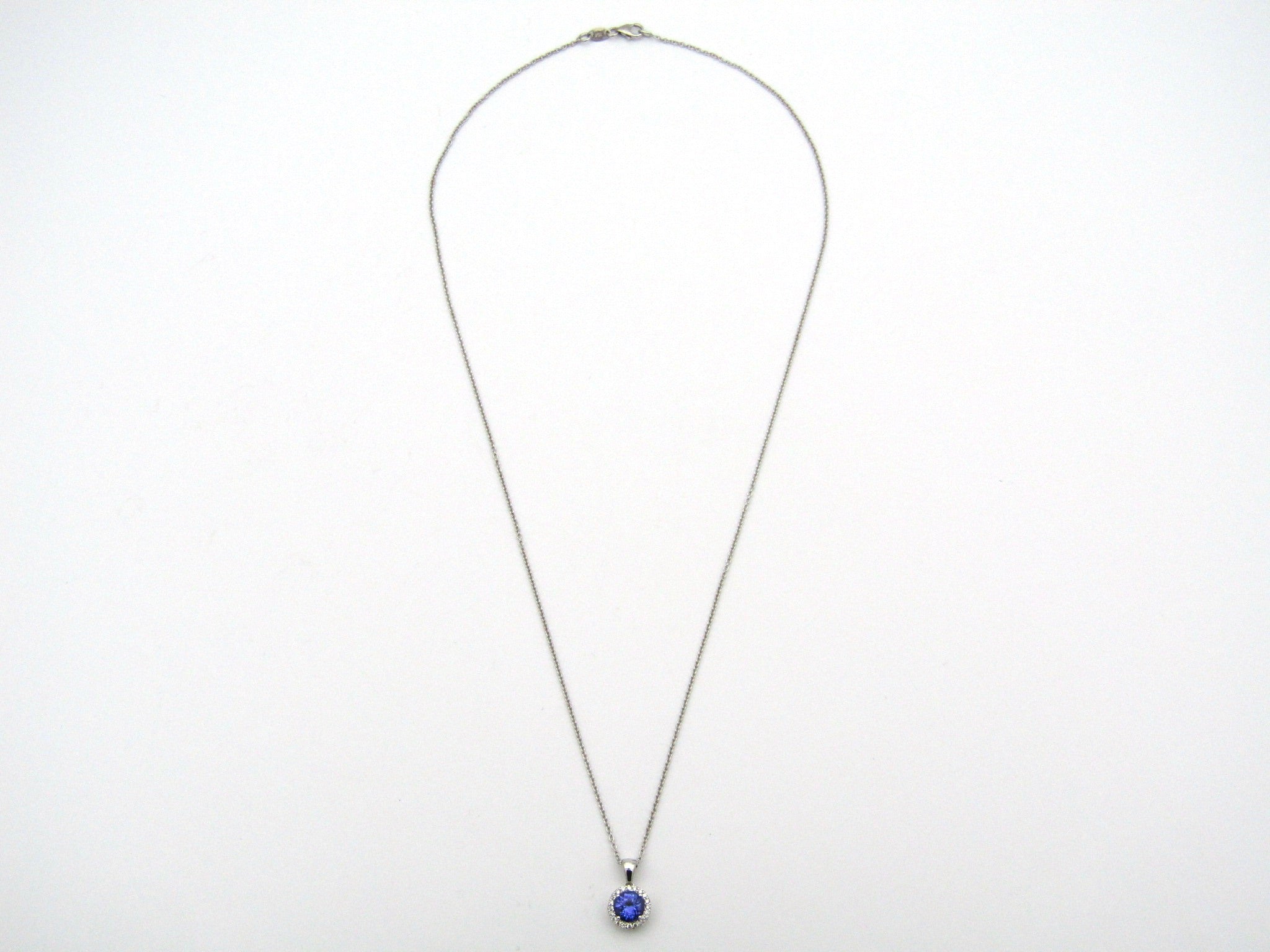 18K gold tanzanite and diamond pendant by Browns.