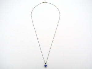 18K gold tanzanite and diamond pendant by Browns.