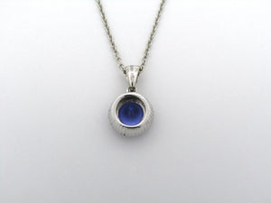 18K gold tanzanite and diamond pendant by Browns.