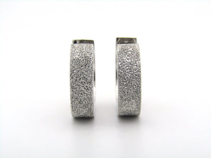 9K gold huggie earrings.