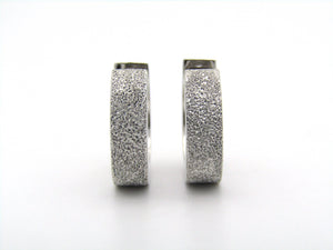 9K gold huggie earrings.