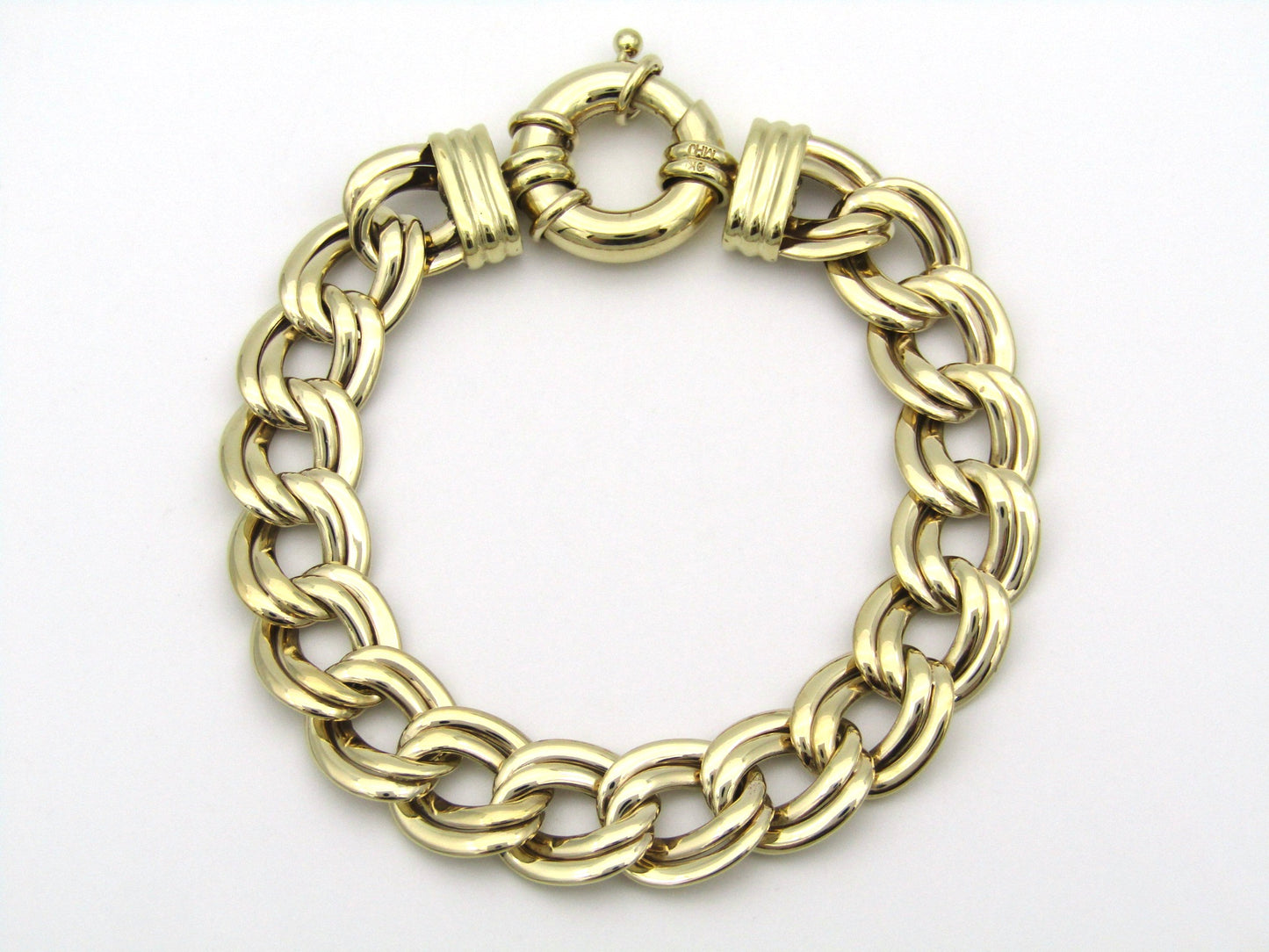 9K gold double curb chain bracelet.