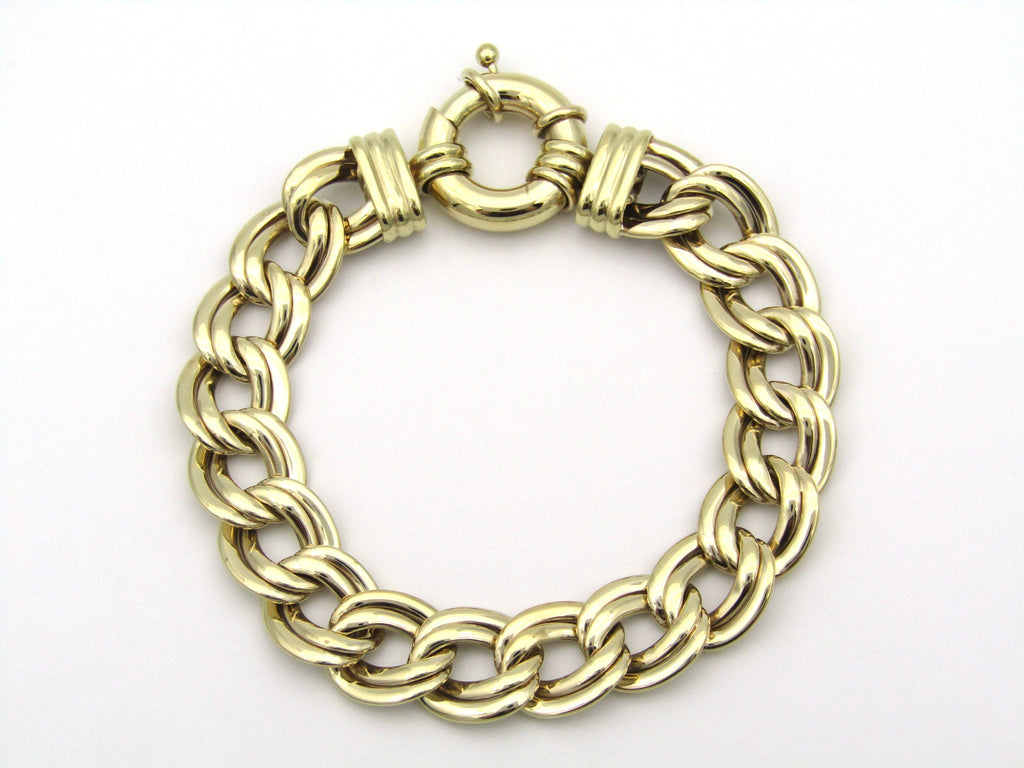 9K gold double curb chain bracelet.