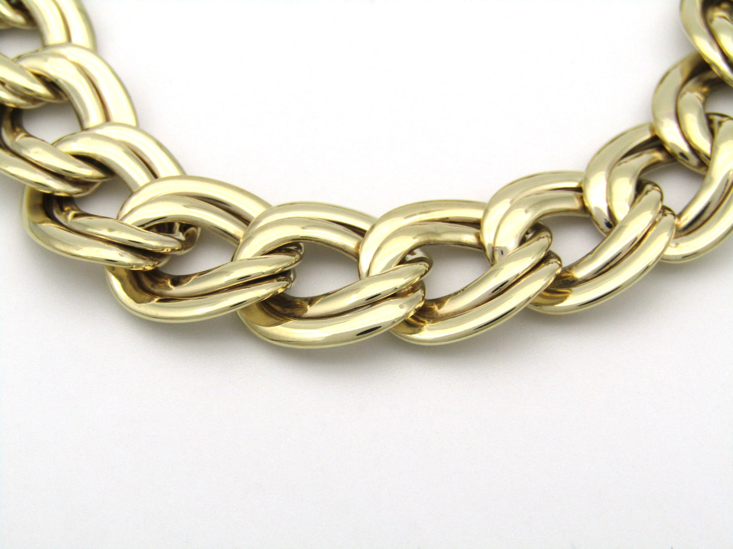 9K gold double curb chain bracelet.