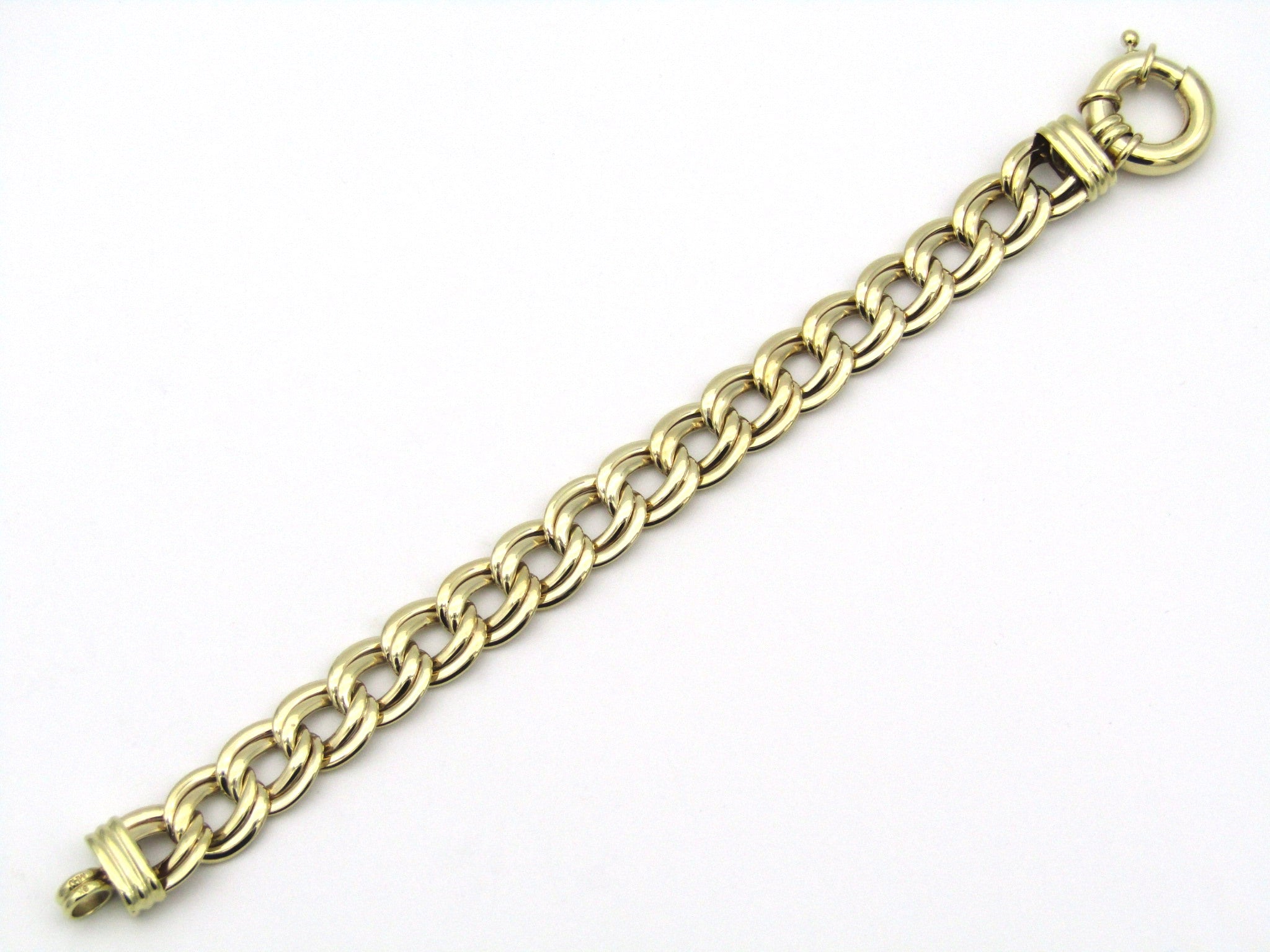 9K gold double curb chain bracelet.