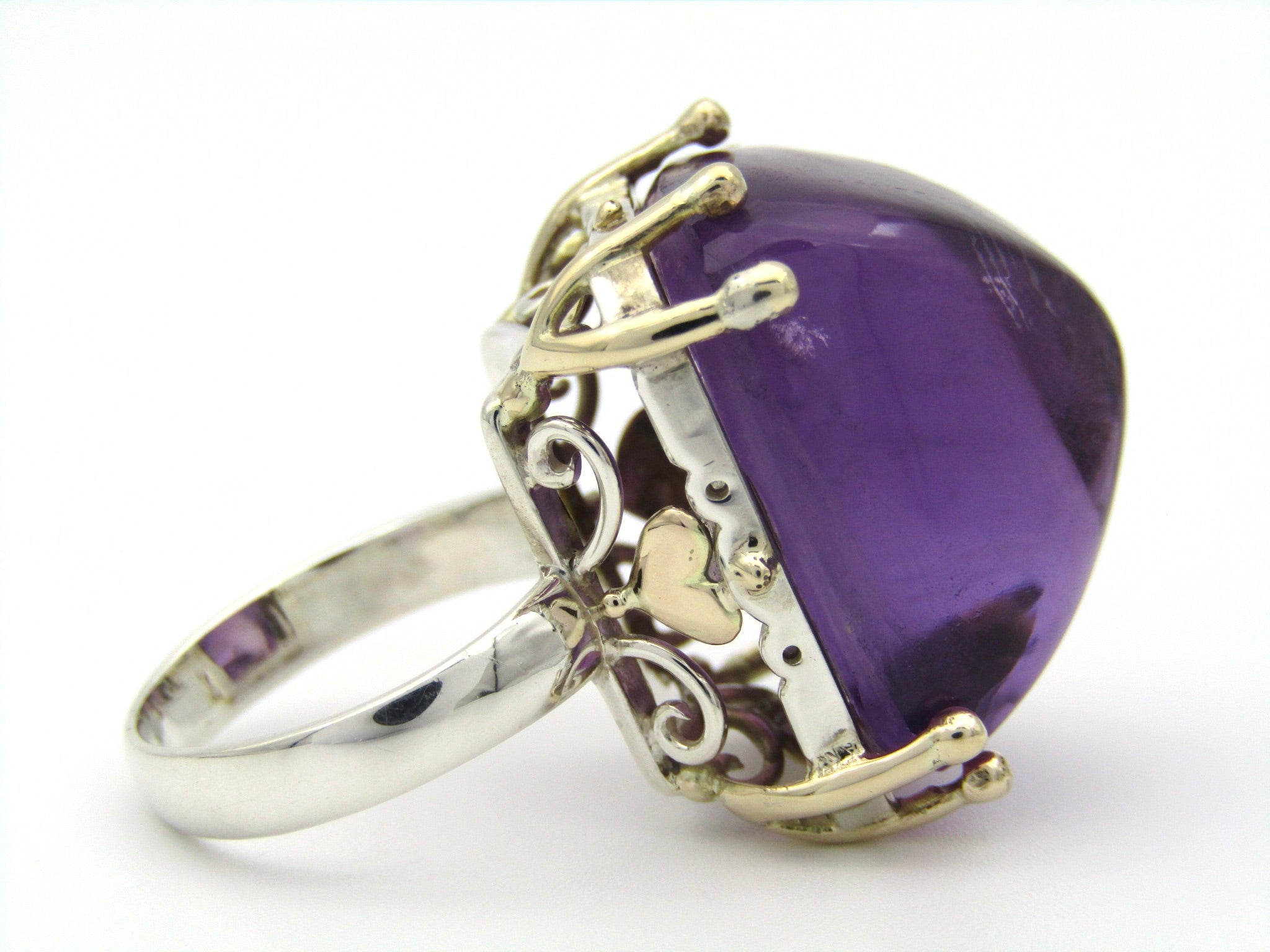 9K gold and sterling silver amethyst ring.