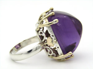 9K gold and sterling silver amethyst ring.