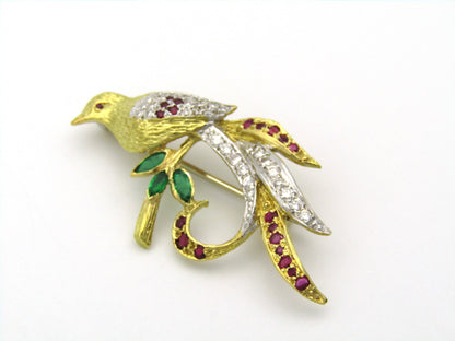 18K gold diamond, ruby, and emerald pheasant brooch.