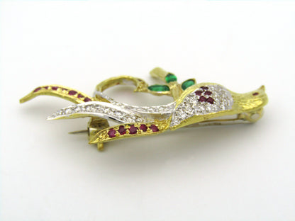 18K gold diamond, ruby, and emerald pheasant brooch.