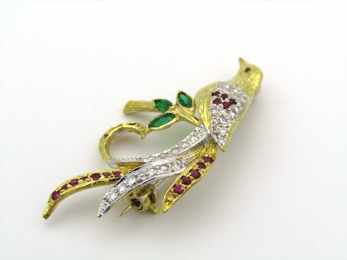 18K gold diamond, ruby, and emerald pheasant brooch.