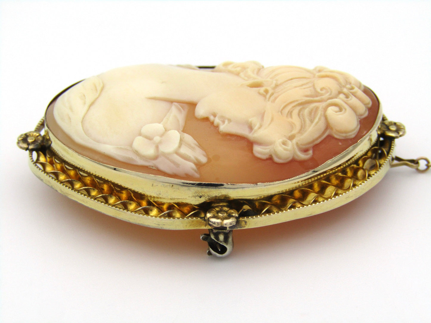 Gold plated shell cameo brooch.