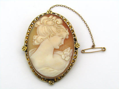 Gold plated shell cameo brooch.