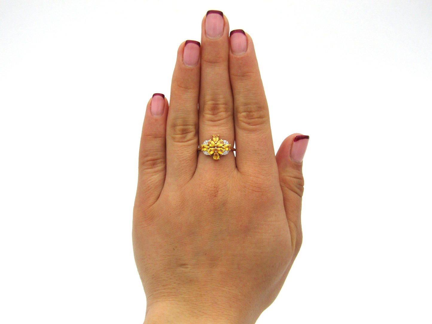 9K gold yellow sapphire and diamond ring.