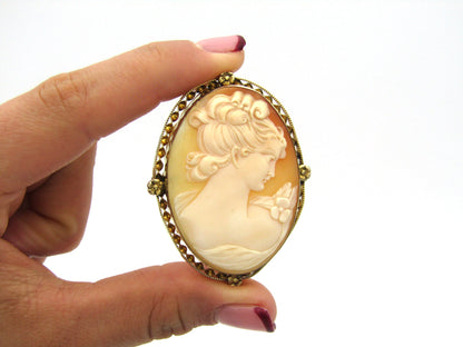 Gold plated shell cameo brooch.