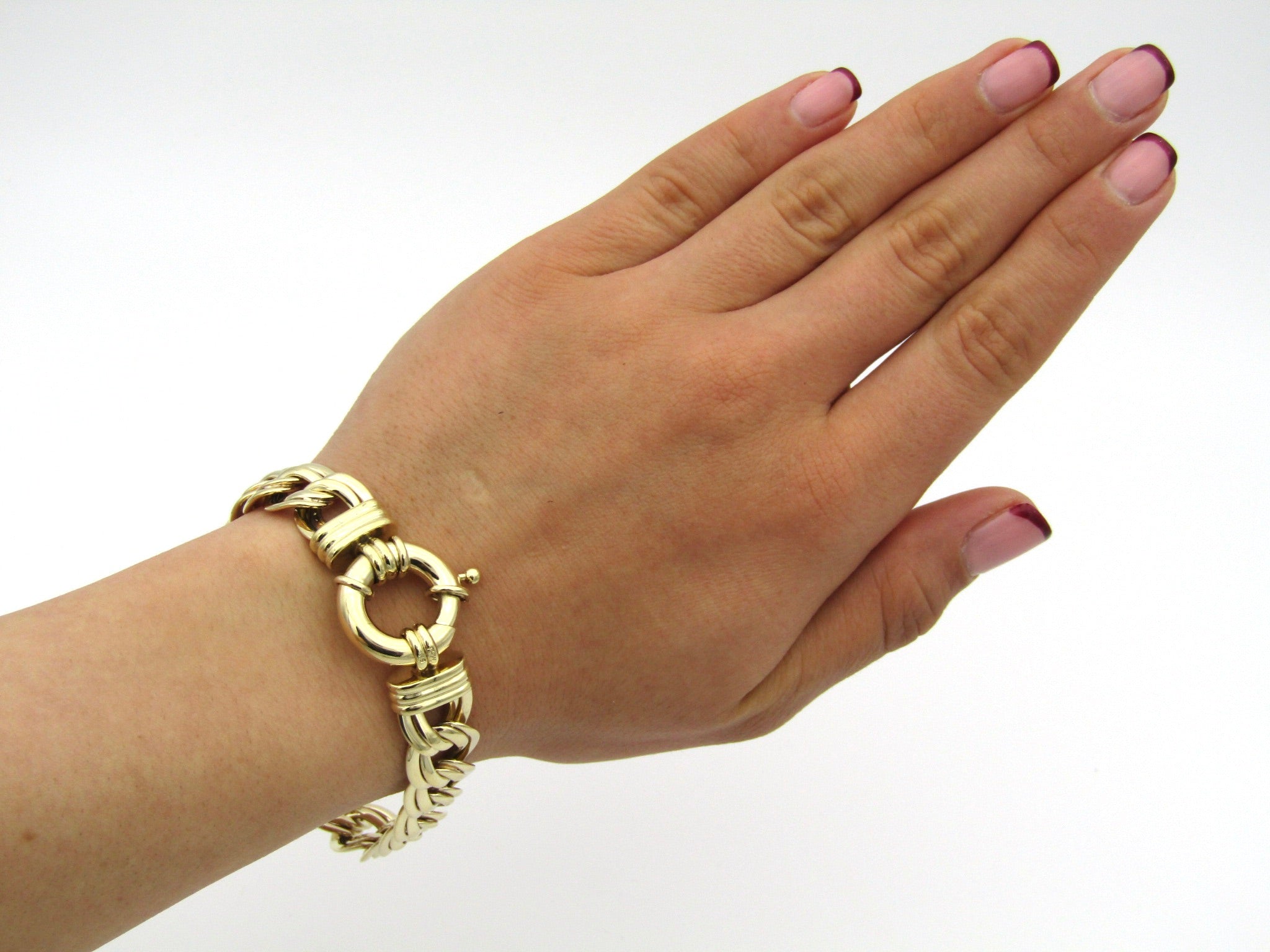 9K gold double curb chain bracelet.